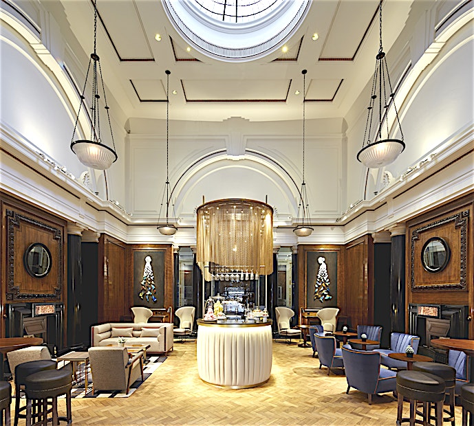 Noes Lobby The stunning Noes Lobby has 2 fireplaces of black Belgian marble on each side. The walls are panelled with polished Indian laurel wood. It is illuminated from both a skylight and several lamps above t